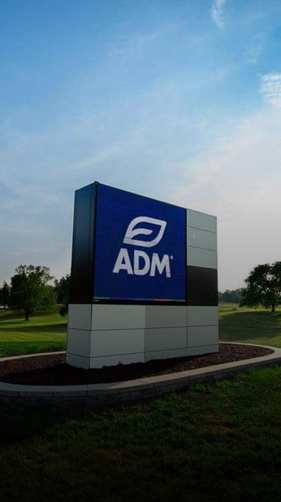 A sign with the ADM logo on it